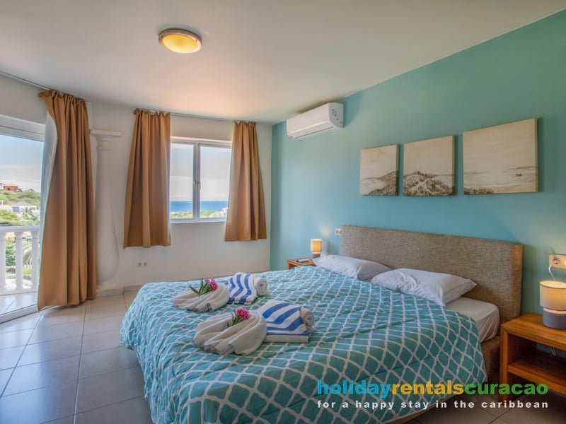 Bedroom with a view of blue bay golf and beach resort