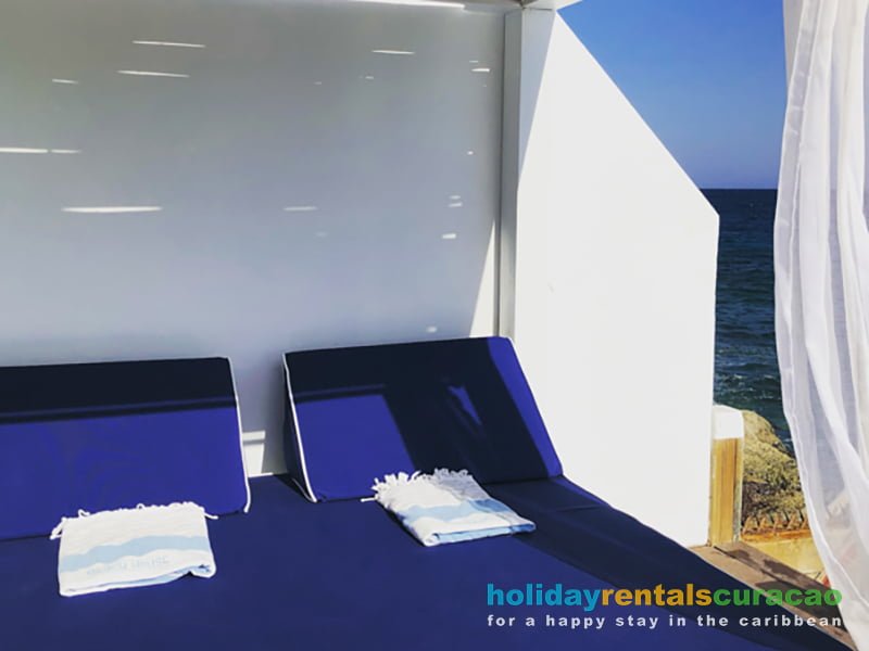 Comfortable and luxurious sunbeds with a sea view.