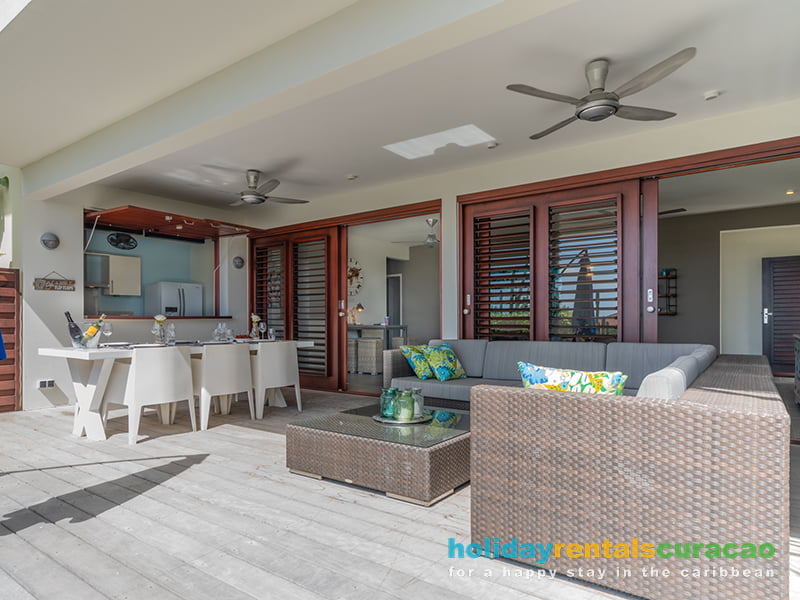 Large covered porch with ceiling fans