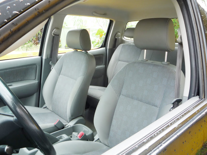 The inside of the pickup with comfortable car seats