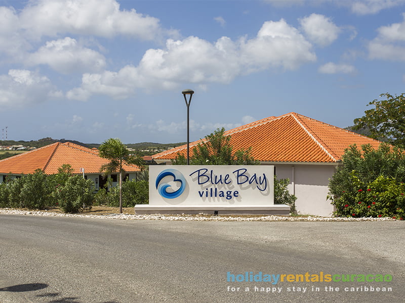 entrance of the village blue bay golf and beach resort