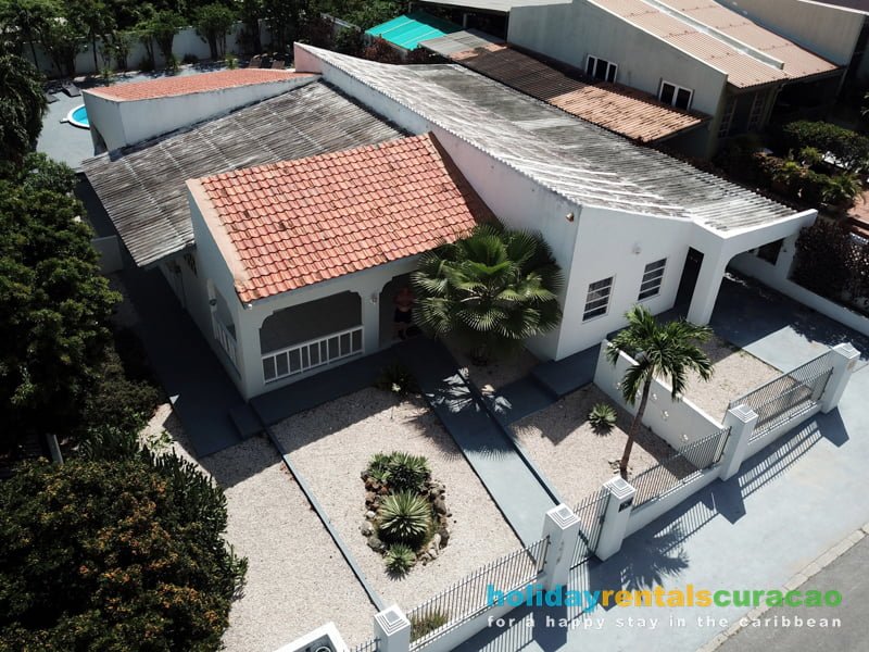 Beautiful aerial view of the rear with private pool.