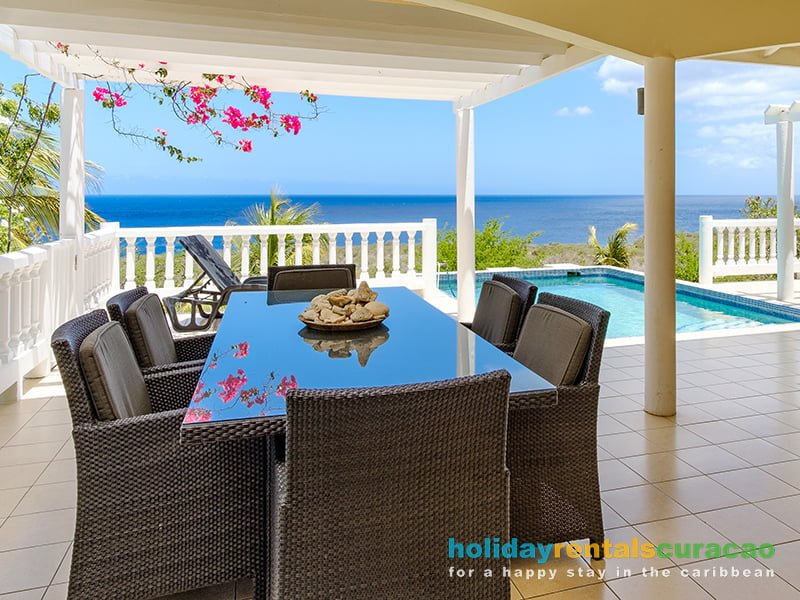 Dine on the veranda overlooking the sea!
